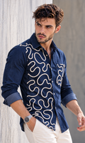 Sculpted Denim 001 by Mark Haydon Atelier — deep indigo denim shirt with hand-stitched ivory braided rope artwork, three-quarter front view
