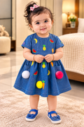 Baby girl fruit embroidered blue denim dress front view by Mark Haydon