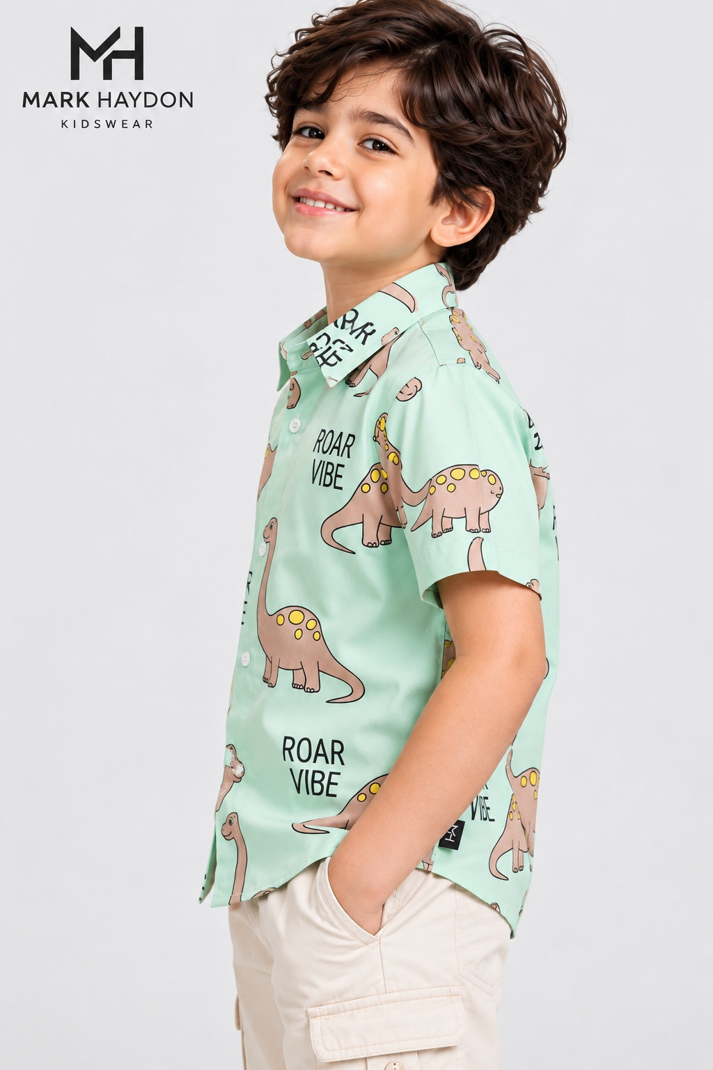 Mark Haydon kids mint green dinosaur shirt side view